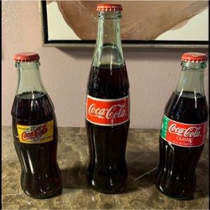 3 Coca-Cola / Coke collector’s bottles. World of Los Vegas and Super Bowl XXXV
